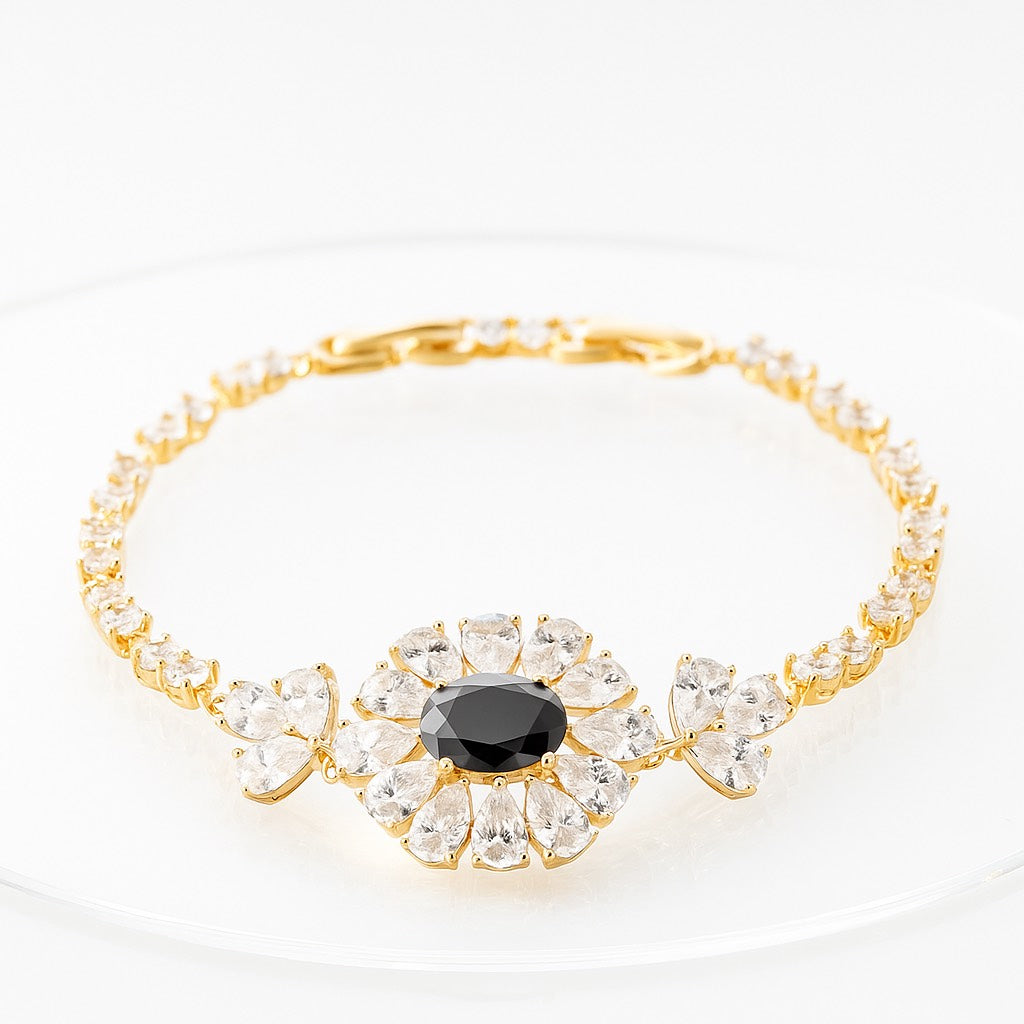 Pulsera Dorada con Brillantes y Perla Negra Central