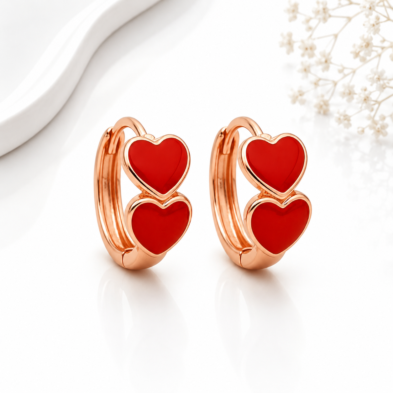 Aretes de dos Corazones Esmaltados