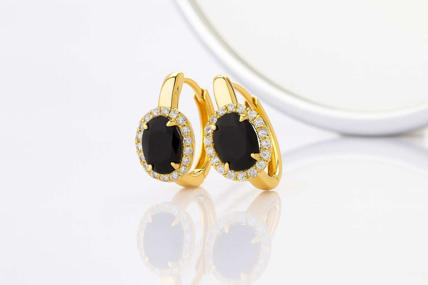 Aretes Ovalados con Piedra Negra