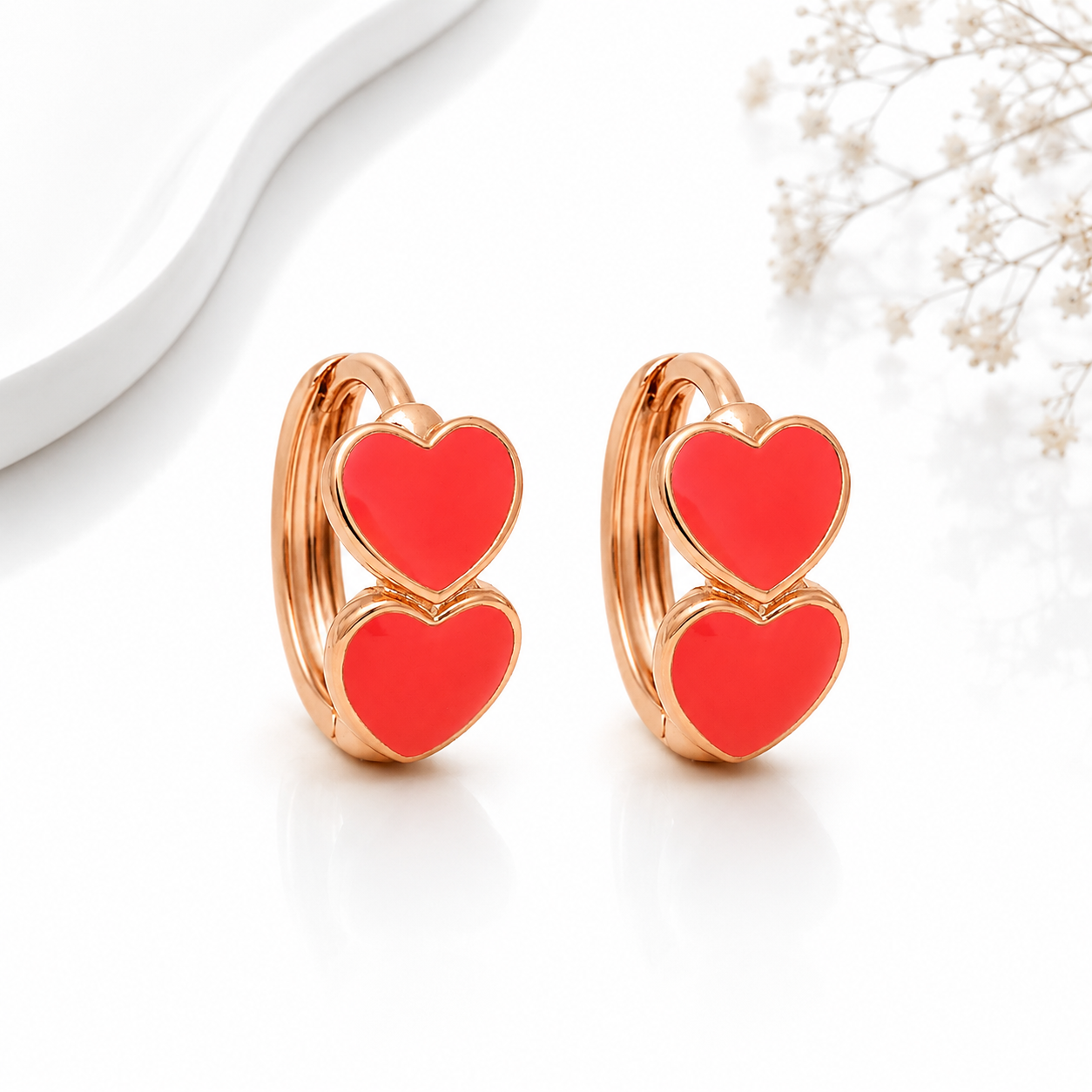Aretes de dos Corazones Esmaltados