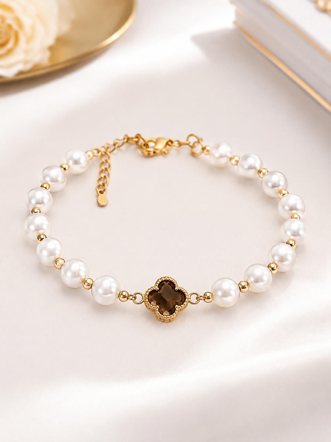Manillas de perlas con flor Central.
