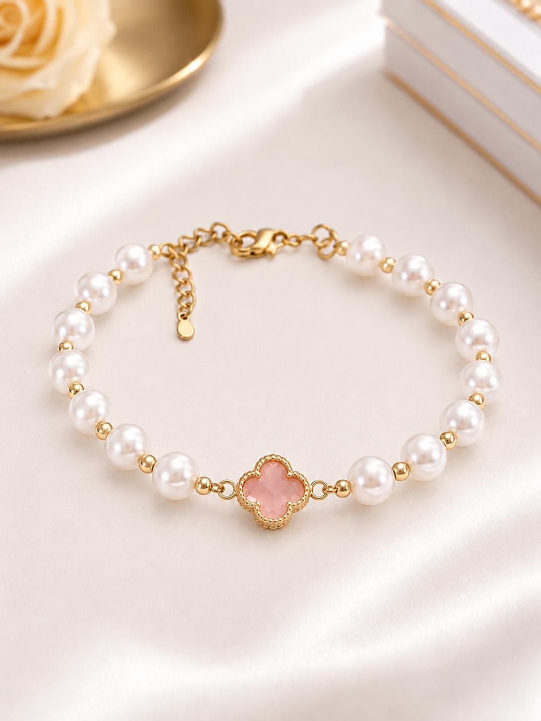 Manillas de perlas con flor Central.