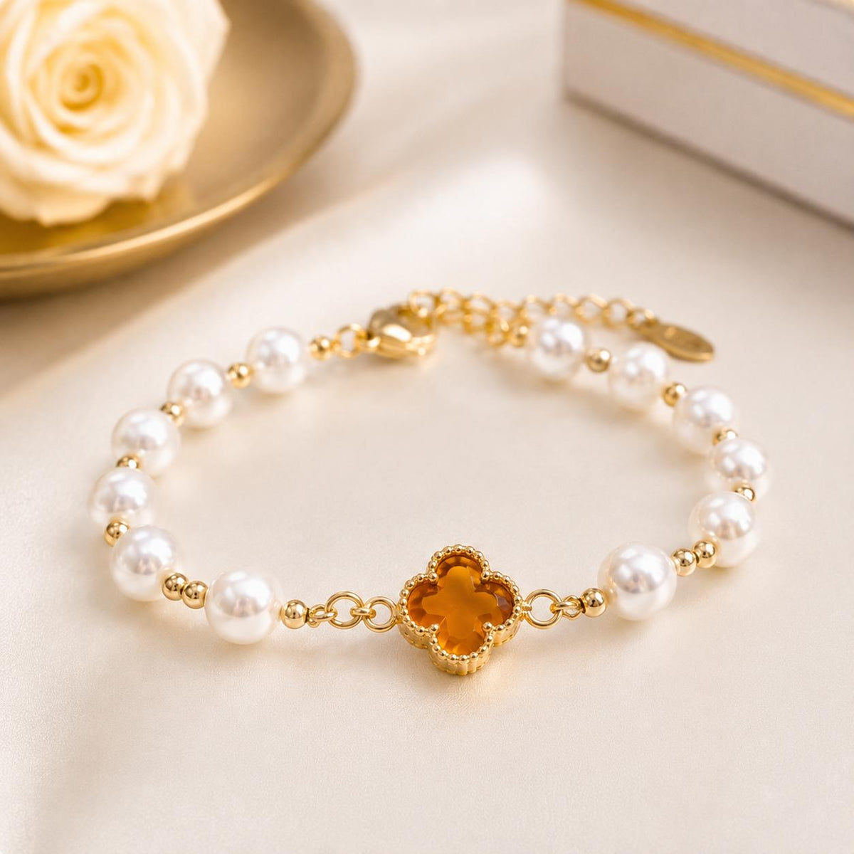 Manillas de perlas con flor Central.