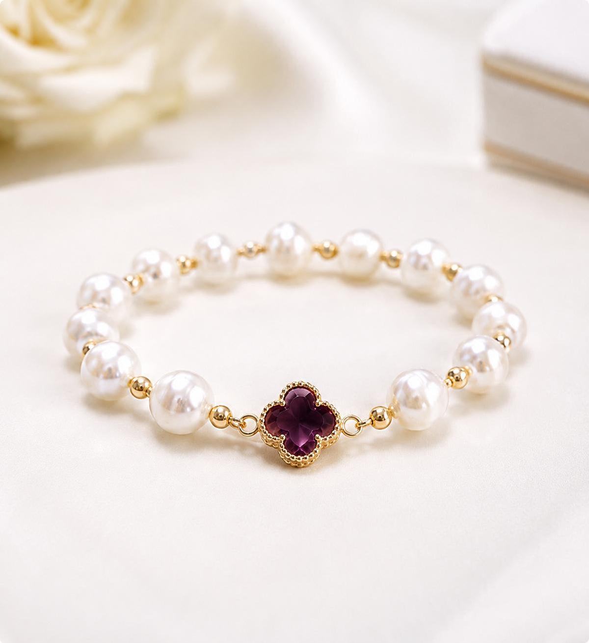 Manillas de perlas con flor Central.